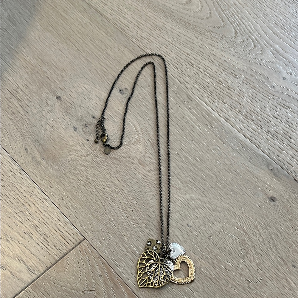 Elegant Gold and Silver Heart Pendant Necklace